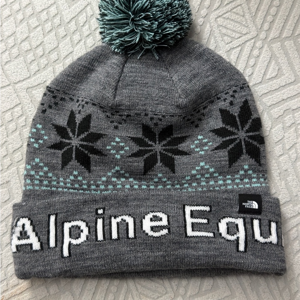 The North Face Gray Beanie with Black Snowflake Design